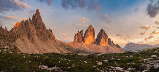 Three peaks of Tre Cime di Lavaredo during sunset