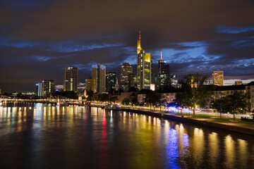 Fototapeta na wymiar Frankfurt city lights starts to shine during blue hour