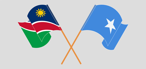 Crossed and waving flags of Namibia and Somalia