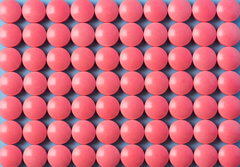 Red Tablets or Medicine Painkiller Pills Background Flat Lay