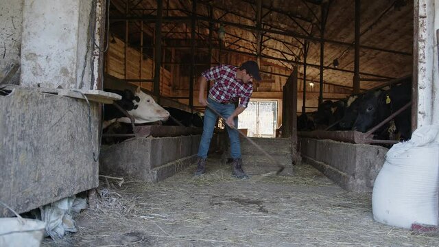 A hardworking farmer cleans on the farm
