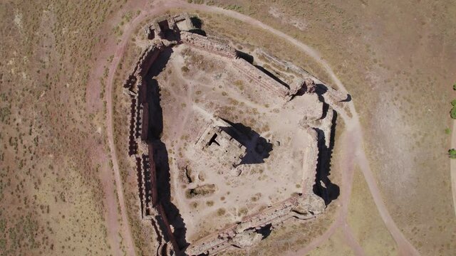 IX century castle in Almonacid de Toledo a small town in Castilla la Mancha. Drone going up