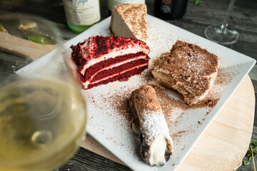 Assorted desserts with wine
