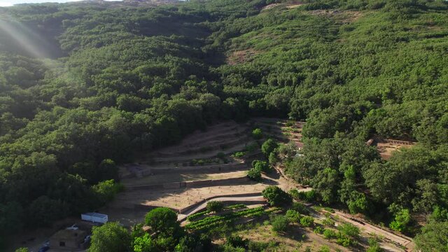 The monastery where Carlos V retired until his death. Big building in the middle of the forest. Drone revealing the building.