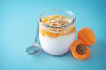 Greek yogurt apricot healthy breakfast in a jar