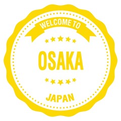 WELCOME TO OSAKA - JAPAN, words written on yellow stamp