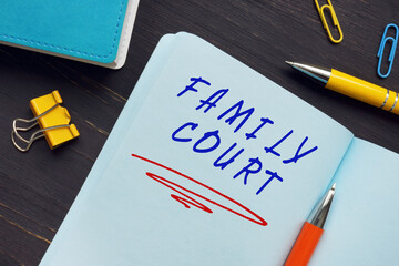 Conceptual photo about FAMILY COURT with handwritten text. Family courts are designed to deal with disputes arising in family matters such as divorce or child custody