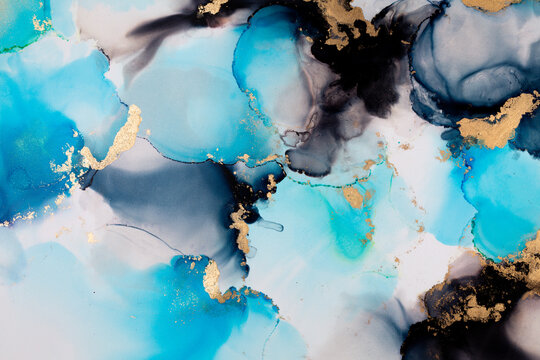Abstract fluid art. Alcohol ink on canvas. Blue, black and gold.