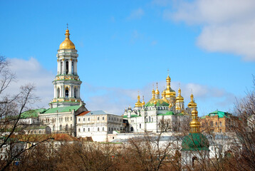 Fototapeta na wymiar big church bell tower and more churches in Kiev Pechersk Lavra in Kiev
