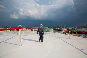 Male worker are for inspection roof plate top