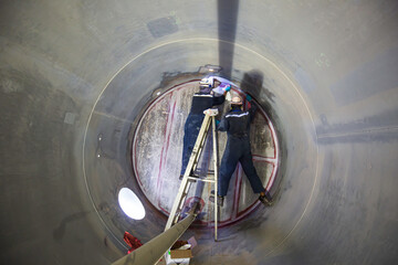 Working male two inspection weld underground of equipment tunnel