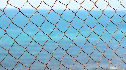 Fototapeta premium link fence against blue sky