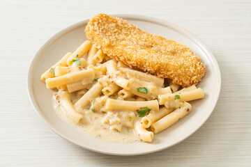 quadrotto penne pasta white cream sauce with fried fish