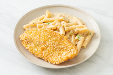 quadrotto penne pasta white cream sauce with fried fish