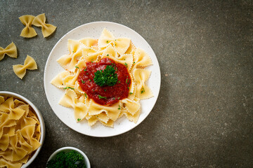 farfalle pasta in tomato sauce with parsley