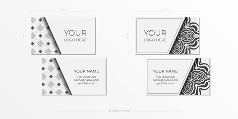 Business cards in white with gorgeous vector patterns with mandala patterns.