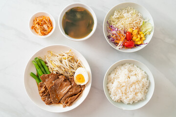 stir-fry Teriyaki Pork with sesame seeds ,mung bean sprouts, boiled egg and rice set