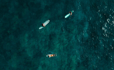 Aerial view of surfers