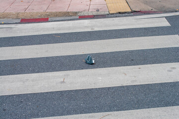 Disposing of the wrong infectious waste,used masks left behind on the crosswalk 