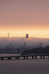 Fototapeta na wymiar San Francisco sunset in a Fog + smoky day.