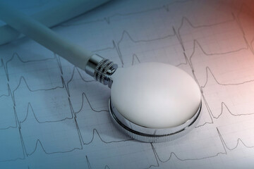 close up of stethoscope on ECG report.