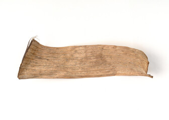 A piece of dry banana leaves isolated on white background.