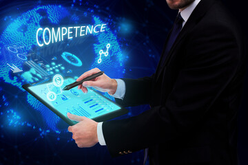 Business, Technology, Internet and network concept. Young businessman working on a virtual screen of the future and sees the inscription: Competence