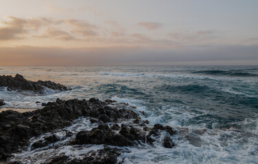 Fototapeta premium Landscape of rock formation in Barronal beach in Cabo de Gata nature park, Spain, during sunrise