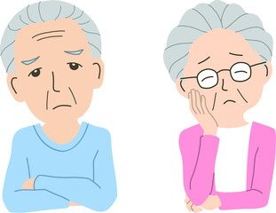 困った顔の高齢者の男性と女性