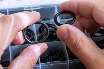 A set of rubber O-rings. Gaskets used in hydraulics, pneumatics and connections of parts of...
