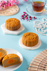 A mooncake  is a Chinese bakery product traditionally eaten during the Mid-Autumn Festival. The Mid-Autumn Festival is widely regarded as one of the four most important Chinese festivals.