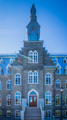 Fototapeta na wymiar Former convent in Beauport historic center, near Quebec City (Canada)on a clear summer day