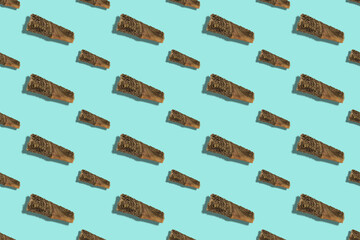 Repeatable pet treats on a pastel blue background. Sticks of dri