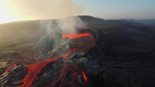 Incredible aerial of the dramatic volcanic eruption of the Fagradalsfjall (Geldingadalur) volcano in Reykjanes peninsula Iceland. Flowing lava. Close look. Drone footage.