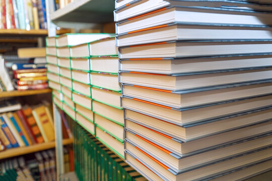 Books on a shelf in the library. Selective focus
