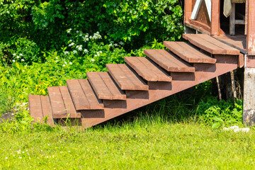 Wooden staircase on the porch