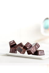 Chocolate jelly, marmalade, candies collection on a light table.