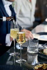 waiter serving champagne