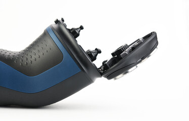 Men's electric shaver with three open shaving heads. 