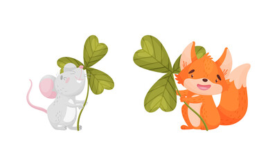 Cute baby animals with three leaf clover set. Adorable mouse, fox holding shamrock leaves cartoon vector illustration