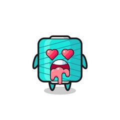 the falling in love expression of a cute yarn spool with heart shaped eyes