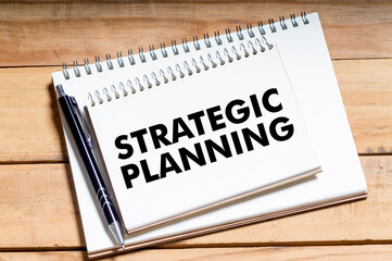 Strategic Planning on notepad with pen