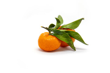orange with leaf on a white background. 