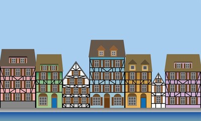 Northern European half-timbered houses. Colorful house facades on the river bank.