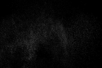 Distressed white grainy texture. Dust overlay textured. Grain noise particles. Snow effect. Rusted black background. Vector illustration, EPS 10.  
