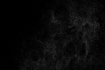 Distressed white grainy texture. Dust overlay textured. Grain noise particles. Snow effect. Rusted black background. Vector illustration, EPS 10.  