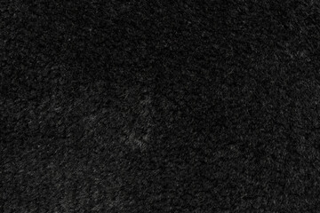 Black wool seamless texture background. dark texture with short factory wool