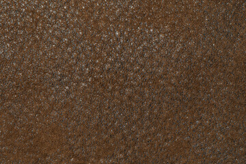 Brown factory material with pile and wool background texture. fur coat texture. sofa texture