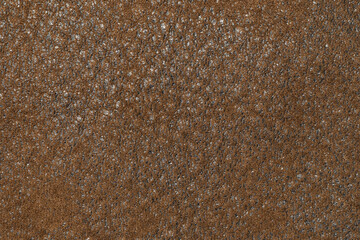 Brown factory material with pile and wool background texture. fur coat texture. sofa texture