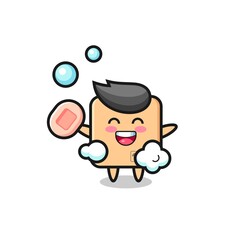 cardboard box character is bathing while holding soap